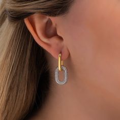 Modern Cubic Zirconia Earrings With Plating, Modern Single Diamond Drop Earring, Modern Drop Diamond Earrings For Everyday Wear, Modern Everyday Drop Diamond Earrings, Modern Single Dangle Diamond Earring, Modern Pierced Earrings With Cubic Zirconia, Modern Cubic Zirconia Linear Earrings, Everyday Diamond Drop Earrings, Minimalist Gold Earrings