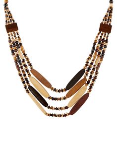 PRICES MAY VARY. Vintage Aesthetic: Elevate your style with this multi-layered long necklace featuring wooden beads for a retro-chic vibe. Layered Design: Crafted with multiple strands, this necklace creates a striking layered look that complements any outfit. Bonus Earrings: Enhance your ensemble with the included pair of coordinating earrings, perfect for a complete and cohesive look. Versatile Accessory: Suitable for casual or dressy occasions, this necklace and earring set is a versatile add Holiday Accessories, Jewelry Holiday, Monochrome Fashion, Layered Design, Holiday Ready, Necklace And Earring Set, Retro Chic, Women's Jewelry, Vintage Aesthetic