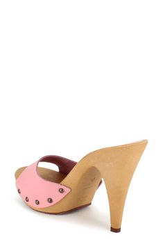 Brushed midsole studs lend retro-inspired allure to a stylish slide sandal lifted by a subtle platform and woodgrain heel. 4 1/2" heel; 1" platform Leather upper and lining/synthetic sole Made in Italy Spring High Heel Clogs With Studded Rubber Outsoles, Pink High Heel Mules With Wooden Heel, Pink Mules With Wooden High Heel, Wooden Open Toe Heels For Spring, Spring Open Toe Wooden Heels, Summer Platform Sandals With Wood Material, Summer High Heel Wooden Mules, Summer Wood Mules With Removable Insole, Wooden High Heel Sandals For Summer