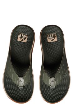 This water-friendly flip-flop grounds you on a contoured footbed and textured rubber sole for stability and traction. Slip-resistant sole Synthetic upper/textile and synthetic lining/rubber sole Imported Green Flip Flops With Textured Footbed, Green Leather Sport Sandals With Cushioned Footbed, Comfortable Green Synthetic Flip Flops, Synthetic Open Toe Flip Flops For Surfing, Comfortable Synthetic Flip Flops With Textured Sole, Comfortable Surfing Flip Flops With Textured Footbed, Comfortable Flip Flops With Textured Footbed For Surfing, Outdoor Flip Flops With Textured Footbed And Round Toe, Synthetic Slides With Arch Support And Round Toe