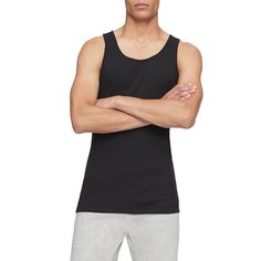 These men's Calvin Klein tanks make the perfect layering piece. These men's Calvin Klein tanks make the perfect layering piece. 3-pack Crewneck Breathable fabric SleevelessFABRIC & CARE Cotton Machine wash Imported Color: Black. Gender: male. Age Group: adult. Pattern: Solid. Layering Pieces, Fabric Care, Breathable Fabric, Age Group, Calvin Klein, Layering, Tank Top, Crew Neck, Tank Tops