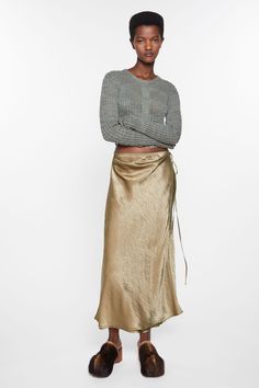 Chic Midi Wrap Skirt With Tie Waist, Chic Midi Skirt With Tie Waist, Chic Tie Waist Midi Skirt, Chic Fall Skirt With Tie Waist, Chic Evening Midi Wrap Skirt, Chic Silk Wrap Skirt With Lining, Chic Silk Lined Wrap Skirt, Chic Tie Waist Flared Skirt, Chic Flared Skirt With Tie Waist