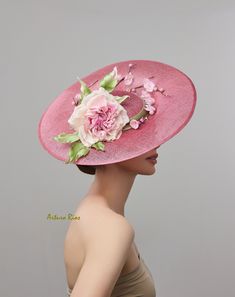 From my 2024 Collection Pretty Large Disk Sinamay hat made in Mauve/Pink tone, embellished with a pretty custom-made Silk rose in Ivory/pink/mauve Silk with crystals, green satin leaves and Vintage silk cherry blossoms. Seated on a velvet headband. All hats are hand made to order, please allow 1-2 weeks, if this is a rush order, please contact me first. All sales are final. Pink Hat With Handmade Flowers And Curved Brim, Pink Flat Brim Fascinator For Spring, Elegant Rose Fascinator For Kentucky Derby, Pink Elegant Flat Brim Fascinator, Elegant Pink Flat Brim Fascinator, Flower Hat For Royal Ascot Races, Elegant Rose Hat For Kentucky Derby, Fascinator Hats Diy, Crystals Green