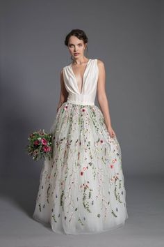 High-quality ecru (off white) lace and tulle maxi skirt MADE TO ORDER. Made of soft tulle and floral embroidery fabric. The skirt has hidden zipper on the side. Perfect as a part of wedding gown for a bride. The skirt will be sewn to your measurments. Maximum length 110 cm. We offer silk bodysuit shown on the picture separately. SIZES: Size XS - Length 110 cm, waist 70 cm Size S - Length 110 cm, waist 74cm Size M - Length 110 cm, waist 78 cm Size L - Length 110 cm , waist 82 cm Size XL - Length Embroidered Full Skirt For Wedding, Spring Wedding Gown With Tulle Skirt, Embroidered Flowy Wedding Skirt, White Floral Embroidered Skirt For Wedding, White Floral Embroidery Skirt For Wedding, White Floral Embroidered Wedding Skirt, White Floral Embroidered Full Skirt Dress, Wedding Maxi Dress With Tulle Skirt, Wedding Maxi Dress With Voluminous Skirt