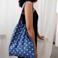 Size: 14”width x 16”length (36cm x 40cm)Color: Indigo/BlueFabric of Pillowcase: CottonDouble Layer/ Inner layer with small pocket for cellphone or key chains.Lightweight tote bag is perfect for boiling summer! The bag is soft but solid. It has two layer of fabric, is able to carry large volume of stuffs. Small pocket for carrying cellphone is included.  Polka dot pattern is a retro design for this summer. It is versatile for all kinds of causal dressing. Blue Large Capacity Bucket Canvas Bag, Blue Double Handle Shoulder Bag For School, Blue Bucket Hobo Bag Large Capacity, Blue Large Capacity Bucket Hobo Bag, Blue Bucket Hobo Bag With Large Capacity, Blue Canvas Shoulder Bag For Daily Use, Blue Canvas Everyday Shoulder Bag, Blue Hobo Shoulder Bag For School, Blue Canvas Shoulder Bag For Everyday Use