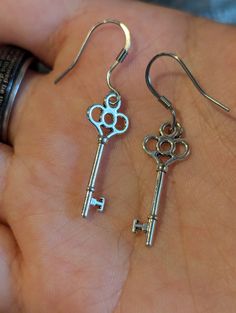 Key Earrings. **Stainless steel **Due to lighting, product may look blurry. Key Earrings, Wedding Gift Baskets, Halloween Shopping, Jewelry Earrings Dangle, Etsy Earrings, Dangle Drop Earrings, Dangle Earrings, Bathing Beauties, Accessory Gift