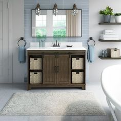 a bathroom with a sink, mirror and bathtub