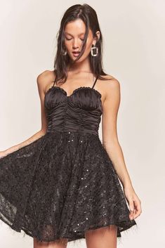 Black Satin Top With Sequin Bottom Contrast Dress Casual Mini Length Dress With Ruched Bodice, Fitted A-line Mini Dress For Prom Season, Fit And Flare Mini Corset Dress For Party, Mini Sequin Prom Dress With Ruffles, Fitted Mini Dress With Lined Bodice For Homecoming, Knee-length Prom Dress With Lined Bodice, Knee-length Lined Bodice Prom Dress, A-line Dress With Ruched Bodice For Night Out, Glamorous A-line Fitted Corset Dress