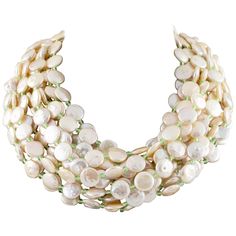 Amazing Multi-Strand Pearl Necklace by Cristina Ferrare Features 11 strands of coin pearls interspersed w/ small briolette-cut green stones Approximate diameter of coin pearls = 10 - 11 mm Includes 18k Yellow- and White-Gold Clasp Total Length = About 18.5" Total Mass = 296.3 grams Cristina Ferrare, Multi Strand Pearl Necklace, Coin Pearl Necklace, Keshi Pearl Necklace, Akoya Pearl Necklace, Nugget Necklace, Vintage Beads Necklace, Heart Pendant Gold, White Gold Chains