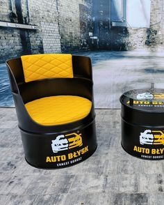 two black and yellow chairs sitting next to each other