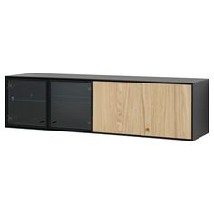 a black and oak cabinet with two doors on one side, the other half open