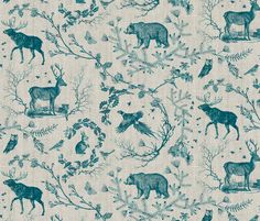 a blue and white fabric with deers, plants and birds on it