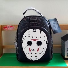 Loungefly Friday The 13th Jason Vorhees Glow In The Dark Mini Backpack White Halloween Backpack For Travel, White Halloween-themed Travel Backpack, Black Standard Backpack For Halloween, Black Halloween Standard Backpack, Black Backpack For Halloween, Black Halloween Backpack, Black Backpack For Halloween Travel, White Backpack For Halloween, Halloween White Backpack