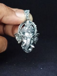 Ganesh pendant, Hindu jewelry, religious gifts. ITEM DESCRIPTION  Dimension product  Height :50 mm width : 30 mm  ITEM DESCRIPTION  Ganesh pendant 925 Sterling Solid This beautiful Ganesh pendant has been amazingly cast with 925 Sterling Silver All products will have stamp 925 on the back or on the inside of product. The weight of the pendant is24-26Grams We are a small business located in Bali, we have export experience for more than 10 years, so we can bring you the best quality goods at the m Symbolic Silver Jewelry For Puja, Silver Symbolic Jewelry For Diwali, Sterling Silver Temple Jewelry For Meditation, Diwali Gift Pendant Jewelry, Silver Spiritual Locket Jewelry, Spiritual Engraved Jewelry For Diwali, Engraved Jewelry For Diwali Gifts, Silver Locket Jewelry For Diwali, Diwali Gift Locket Jewelry