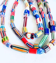 "You will receive: Artisan handcrafted assortment Ethnic African & Nepalese rare Glass beads. Mix Shapes, sizes & colors glass chevron beads. Very Unique, you'll love them! Sold by strand 15\" by strand random size and shapes Random Size from : 6-40mm Approx hole from: 1-3mm Please select qty at drop box Contact me if you need larger quantity. *Please note these are hanmade beads, not close to perfect, they are unique and rare some are raw cut and unpolished*" Multicolor Recycled Glass Bead Jewelry, Multicolor Recycled Glass Beaded Jewelry, Bohemian Czech Glass Oval Beads, Bohemian Oval Czech Glass Beads, Multicolor Recycled Glass Beads For Jewelry Making, Colorful Bohemian Spacer Beads, Bohemian Colorful Spacer Beads, Multicolor Recycled Glass Jewelry For Jewelry Making, Colorful Bohemian Faceted Beads