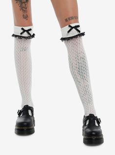 Spice up your look with these white  crochet over-the-knee socks! The come with cuff detailing at the top and dainty  black satin bow accents.NylonHand wash cold; drip dryImported Spring Thigh-high Legwear With Lace Trim, White Lace Thigh-high Legwear, White Over-the-knee Winter Legwear, Winter Lace Fitted Legwear, White Over-the-knee Knee-high Socks For Winter, Fitted Lace Trim Socks For Winter, Fitted Lace Trim Winter Socks, White Knee-high Stockings For Spring, White Thigh High Socks For Fall