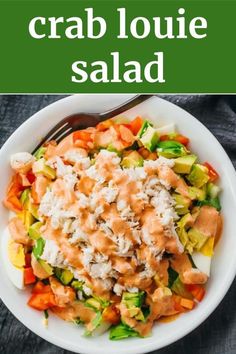 a white bowl filled with crab and vegetable salad