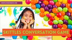 an advertisement for the skittle's conversation game, with colorful balls in the background