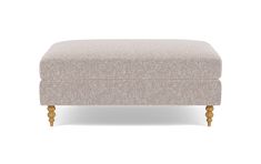 the footstool is upholstered with wooden legs and an upholstered cushion