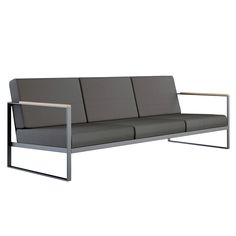 a gray couch with metal frame and arm rests on an isolated white background for display