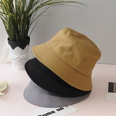 Our Women's Fashion Cotton Bucket Hat is trendy for a reason. Is the perfect accessory not just for summer, but any season of the year. Enjoy worldwide free shipping and easy returns on us! Trendy Solid Color Bucket Hat For Outdoors, Trendy Cap-style Sun Hat, Trendy Solid Color Hat For Everyday, Trendy Solid Color Sun Hat Cap, Trendy Solid Everyday Hat, Trendy Solid Color Everyday Hat, Trendy Summer Cap, Trendy Solid Color Bucket Hat For Summer, Trendy Solid Bucket Hat For Summer