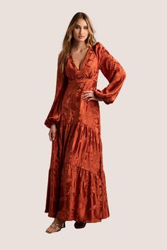 Take your formal wear to the next level in the Melissa Long Sleeve Maxi Dress. This stunning design features a flattering V-neckline, a keyhole back, and a flowy A-line skirt. The perfect style for any special occasion. Plus Size Fall Formal Dresses, Rust Prom Dress Burnt Orange, Fall Dresses For Family Pictures, Boho Dress To Impress, Long Sleeve Dress Wedding Guest, November Wedding Guest Dress, Autumn Wedding Guest Outfit, Long Sleeve Flowy Maxi Dress, Long Western Dresses