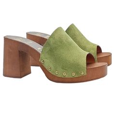 For a woman, clogs are the winning compromise between a comfortable and comfortable shoe and a pair of sandals capable of slimming the figure thanks to a few extra centimetres. Green gives a sophisticated touch, all the quality of Made in Italy at your feet at a great price! Clogs with brown wood effect base Wide band in green suede Heel height 9 cm and plateau 3 cm. Made entirely by specialized Italian personnel Handcrafted products using the best materials. BEFORE PURCHASING DO NOT FORGET TO C Green Clogs With Removable Insole, Green Open Heel Sandals With Rubber Sole, Green Closed Toe Mules With Cushioned Footbed, Green Spring Clogs With Removable Insole, Green Suede Closed Toe Sandals, Spring Suede Mules With Wooden Heel, Summer Green Mules With Wooden Heel, Suede Open Heel Clogs For Spring, Summer Suede Clogs With Stacked Heel