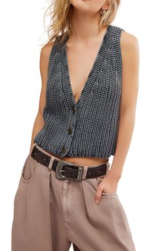 Love to layer in this chunky sweater-vest knit in a cropped silhouette with a low-dipping neckline. 16" length (size Medium) Front button closure V-neck 100% cotton Hand wash, dry flat Imported Free People Vest, Cropped Sweater Vest, Oversized Cropped Sweater, Close To Me, Vest For Women, Denim Maxi Skirt, Woven Top, Chunky Sweater, Knit Vest