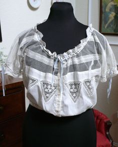 Fitted Camisole Blouse For Daywear, Victorian Lace Trim Top For Daywear, Victorian Fitted Tops For Summer, Fitted Victorian Tops For Summer, Fitted Victorian Summer Tops, Victorian Cotton Top With Lace Trim, Victorian Cotton Tops With Lace Trim, Victorian Cotton Tops For Summer, White Victorian Blouse For Summer