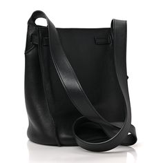 This is an authentic CELINE Supple Grained Calfskin Long Strap Big Bag Bucket in Black. This chic structured bucket bag is crafted of finely grained calfskin leather in black and features a tall rolled leather top handle. The top is open to a suede interior. 1380301 Celine Box, Small Buckets, Big Bag, Natural Tan, Big Bags, Black Cross Body Bag, Flap Bag, White Bag, Leather Top