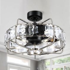 The 22.8" 2-in-1 crystal ceiling fan with light and remote has a luxurious and unique appearance, so that the ceiling fan light makes a hazy light in the room through clear crystal and 5 * E12 bulbs(included), keeping the interior of the home noble and exquisite, fashionable. This modern caged ceiling fan looks great and is hidden in a cage to avoid accidents caused by entangled air blades, so it is safer than traditional fans. Plus, the enclosed ceiling fan is embedded with a quiet pure copper Fandelier Ceiling Fan, Gold Ceiling Fan, Caged Ceiling Fan, Cage Chandelier, Ceiling Fan Light Kit, Ceiling Fan Chandelier, Canopy Lights, Ceiling Fan With Remote, Unique Lighting