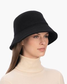 A cozy, lightweight women's bucket hat of spun wool with trapunto stitched brim rolls up easily into a coat pocket or a tote bag. Eric says, "It's definitely a bucket hat season where the attitude is a bit more casual than a fedora." What makes this women's bucket hat most desirable is that the crown is spun and then blocked to achieve the shape; The crown has no visible seams so it doesn't feel thick, while providing great insulation and protection from the elements. Brim span: 2.75"(7cm) Fully