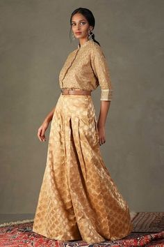 Gold shirt kurta with floral aari and sequin embroidery. Comes with floral butta, pleated palazzo. - Aza Fashions Eid Elegant Tussar Silk Blouse, Festive Long Sleeve Tussar Silk Palazzo Set, Designer Cotton Silk Palazzo Set With Unique Design, Designer Cotton Silk Palazzo Set With Self Design, Designer Long Sleeve Cotton Silk Choli, Elegant Long Sleeve Tussar Silk Anarkali Set, Cotton Silk Long Sleeve Palazzo Set For Navratri, Elegant Slub Silk Blouse For Navratri, Long Sleeve Cotton Silk Palazzo Set For Navratri