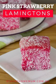 pink strawberry lamingtons on a white plate with the words, pink strawberry lamingtons