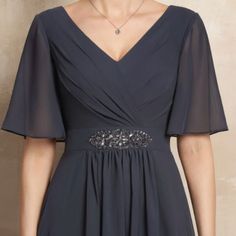 V-Neck Ankle-Length Chiffon Mother Of The Bride Dress With Ruffle Beading Sequins. Color: Steel Grey Built In Bra. Sleeve: 1/2 Sleeves Back Style: Zipper Up Size Bust (Inch) -- 45. Waist (Inch)-- 38 1/2. Hips (Inch)-- 47 1/2. Hollow To Hem(Front) (Inch) -- 56. Smoke Free And Animal Free Home. Dress Is In Perfect Condition. Fesyen Rambut, Ruffle Beading, Chiffon Evening Dresses, Beaded Chiffon, Ankle Length Dress, فستان سهرة, Mothers Dresses, Chiffon Ruffle, Mother Of The Bride Dress