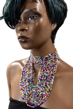 This Enigye beaded choker necklace is an expertly-crafted handmade piece from our artisans in Kenya. The one-size closure at the back ensures a secure and comfortable fit. Enhance your style with this stunning choker necklace and add a touch of elegance to any outfit. Trendy Festival Beaded Chain Choker, Party Beaded Necklaces With Polished Beads, Large Beads Festival Choker, Festival Large Beads Choker, Unique Adjustable Choker For Parties, Adjustable Large Beads Bib Necklace For Party, Unique Beaded Choker Necklace For Festivals, Unique Beaded Festival Choker Necklace, Unique Beaded Chain Choker