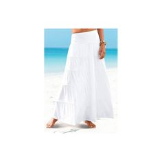 Flowy maxi skirt made from soft, draping fabric with tiers and over stitched seams. * Elasticated waistband * Slightly lower rise * Soft stretch fabric * Runs large * Length approx. 35.5 inches * Viscose/elastane. Imported. * Machine wash cold with like colors, inside out * Hang to dry or lay flat Beach Maxi Skirt With Gathered Detail, Beach-style Gathered Maxi Skirt, Beach Tiered Maxi Skirt With Ruffled Details, Beach Tiered Ruffled Maxi Skirt, Beach Tiered Maxi Skirt, Tiered Beach Maxi Skirt, Stretch Wide Leg Beach Skirt, Beach Ruffled Tiered Maxi Skirt, Beach Stretch Maxi Skirt With Lining