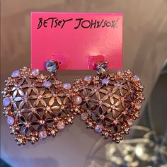 This Listing Is For A Stunning Pair Of Authentic Betsey Johnson Earrings!! These Earrings Are Show Stoppers!!! In A Beautiful Rose Goldtone Flowers And Rhinestones Take The Shape Of Hearts That Dangle From A Rhinestone Stud!!! These Earrings Are As Rare As They Are Beautiful! Rose Gold Double Heart Jewelry For Party, Valentine's Day Party Flower Earrings For Pierced Ears, Elegant Pink Heart Metal Earrings, Valentine's Day Rose Gold Heart Earrings For Party, Rose Gold Metal Heart Earrings For Valentine's Day, Heart-shaped Rose Gold Earrings, Black Cat Earrings, Crystal Pearl Earrings, Spider Earrings