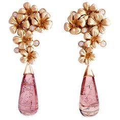 Plum Blossom contemporary cocktail clip-on earrings are in 18 karat rose gold. They are encrusted with 10 round diamonds and removable drops of natural pink tourmalines (about 16.4 carats), which can be taken off. This jewellery collection was featured in Vogue UA, designed by the oil painter from Berlin, Polya Medvedeva. The length of each earring is 5 cm. We use top natural diamonds VS, F-G, we work with german gems company, that in the market since 19th century. The earrings fit best to class Designer Earrings Studs, Sparkling Jewelry, White Diamond Earrings, Cocktail Earrings, Contemporary Earrings, Natural Jewelry, Gold Cocktail, Sparkle Jewelry, Earrings Studs