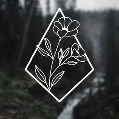 a sticker on the side of a window with a flower in front of a waterfall