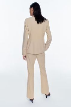 Style: Elegant,Office Fit: Loose Fabric: Polyester Pattern: Solid Element: Button,Pocket Neckline: Crew Neck Sleeve Type: Regular Sleeve Length: Long Sleeve Rise: High Rise Main Composition: Polyester Pant Length (Set): Full Top Length (Set): Regular Season: Spring/Fall Beige Formal Pantsuit With Pockets, Workwear Pantsuit With Pockets And Suit Collar, Office Wear Bottoms With Pockets And Suit Collar, Lapel Collar Pantsuit With Pockets For Work, Tailored Office Pantsuit With Pockets, Fitted Solid Color Pantsuit With Pockets, Beige Dress Pants With Pockets For Work, Beige Office Suits With Pockets, Spring Workwear Pants With Single Button