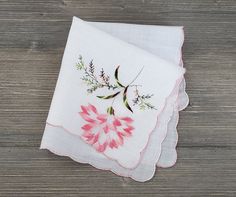 10% Off 2 or More Code SAVE10 Embroidered Vintage Handkerchief ~ One pink carnation is featured on this soft cotton hankie.  The flower and scalloped hem are embroidered with variegated satin floss. A perfect vintage handkerchief for  any occasion! Measures 11 x 11 inches Thanks for visiting → RoseAnaDana.Etsy.com . Pink Handkerchiefs For Summer Gifts, White Handkerchiefs As Spring Gifts, White Handkerchiefs For Spring Gifts, Spring Gift White Handkerchiefs, Floral Embroidered Handkerchiefs For Spring Wedding, White Cotton Handkerchiefs For Spring, Spring Wedding Handkerchiefs With Floral Embroidery, Spring Handkerchiefs With Floral Embroidery As Gift, Floral Embroidered Handkerchiefs For Spring Gift