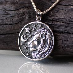 "Leo: The Lion Dates: July 23 - August 22 Element: Fire Modality: Fixed Ruler: Sun   Positives: Passionate | Humorous | Creative   Negatives: Arrogant | Lazy | Self Centered      This recycled sterling silver♻️ necklace is double sided. One side shows the virgin and the other shows the symbol for Mercury which is Virgo's planetary ruler. It measures 5/8\" in diameter. It comes on a 1mm rounded box chain in your choice of 16\", 18\", 20\" or 24\" long." Spiritual Coin Charm Jewelry, Spiritual Coin Charms Jewelry, Spiritual Coin-shaped Charms Jewelry, Spiritual Sterling Silver Coin Pendant Jewelry, Sterling Silver Spiritual Coin Pendant Jewelry, Sterling Silver Medallion With Moon Charm, Sterling Silver Moon Charm Medallion Jewelry, Sterling Silver Medallion Jewelry With Moon Charm, Spiritual Silver Jewelry With Coin Pendant