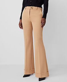 The versatile, streamlined look is back - our cuffed trouser pant is ultra flattering. Front zip with extended button tab closure. Front off-seam pockets. Back besom pockets.,Leg Shape:Leg Shape: Trouser – a pant with a bit of flare that lengthens legs,Rise:High rise: sits 1/2" to 1" below natural waist,Imported:Imported,Fit:Fit: Tailored & fitted,Length:Full length: 29" inseam with 21" leg opening,Fabrication:64% Polyester, 31% Viscose, 5% Elastane,Garment Care:Machine Washable The Petite Cuffed Tab Waist Trouser by Ann Taylor Size petite - 6 Perfect Camel Women's Regular, Trouser, Pants, 64%, Polyester, 31%, Viscose, 5%, Elastane, Machine, Washable Tailored Bottoms With Button Cuffs For Office, Fall Flat Front Bottoms With Button Closure, Tailored Pants With Button Cuffs For Fall, Chic Workwear Bottoms With Button Cuffs, Chic Bottoms With Button Cuffs For Work, Fitted Dress Pants With Button Cuffs For Work, Formal Pants With Button Cuffs For Fall, Flat Front Bottoms For Workwear In Fall, Flat Front Pants For Workwear, Fall Season