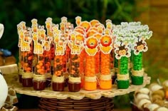 an assortment of carrots and candies displayed on a table