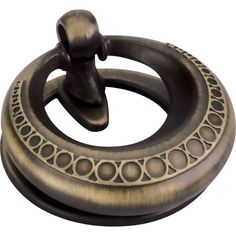 an image of a metal object with circles on it's center and the handle