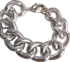 Chunky Chain Link Metal Bracelets, Silver Link Bracelet With Chunky Chain, Trendy Chunky Link Chain Bracelet, Trendy Silver Chain Bracelet With Solid Links, Silver Chain Bracelet With Chunky Links, Silver Chunky Chain Link Bracelet, Silver Bracelets With Chunky Oval Link Chain, Silver Oval Link Chunky Chain Bracelet, Modern Chunky Silver Bracelet