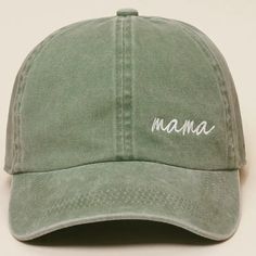 a green baseball cap with the word mama embroidered on it's front and back