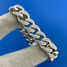 * Custom 10K White Gold Diamond Encrusted Cuban Link Heavy Bracelet * Length: 8.0" * Width: 1/2" * Diamonds measure approximately 1.1 mm each * Bracelet weight: 101.4 tgw * Diamond color: H-J * Diamond clarity: SI * Marked: 10K * Condition: As pictured. * G3143    Exported By ExportYourStore :) Fine Jewelry Bracelets, Cuban Link, Diamond Color, Bracelets And Charms, Diamond Clarity, White Gold Diamonds, Colored Diamonds, Gold Diamond, Jewelry Watches