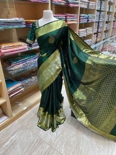 Feel beautiful and stylish in this traditional Kanjeevaram Silk Saree NK-001! Featuring bold floral designs on ultra-soft fabric, this luxurious saree is designed to make you feel like royalty. Perfect for special occasions, it's a timeless classic that will make you shine. Diwali Paithani Silk Traditional Wear, Bollywood Style Designer Banarasi Silk Traditional Wear, Green Katan Silk Traditional Designer Wear, Traditional Green Designer Saree, Elegant Green Zari Weaving Traditional Wear, Designer Pre-draped Saree With Zari Weaving For Festivals, Navratri Designer Paithani Silk Traditional Wear, Designer Gold Saree With Traditional Patterns, Elegant Green Traditional Wear With Zari Weaving